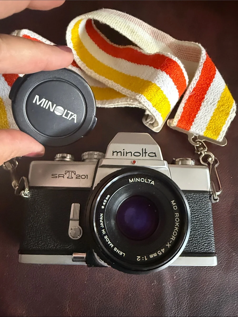 Minolta SR-T 201 35mm Film Camera in Silver and Black with Retro Stripe Strap